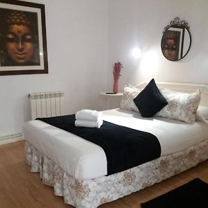 Kamer met een Queen Size Bed